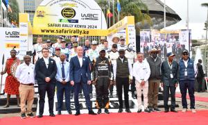 President William Ruto, Sports CS Ababu Namwamba, Sports PS Peter Tum and other WRC safari rally Kenya 2024 stakeholders posing for a photo during the flagging off ceremony at KICC